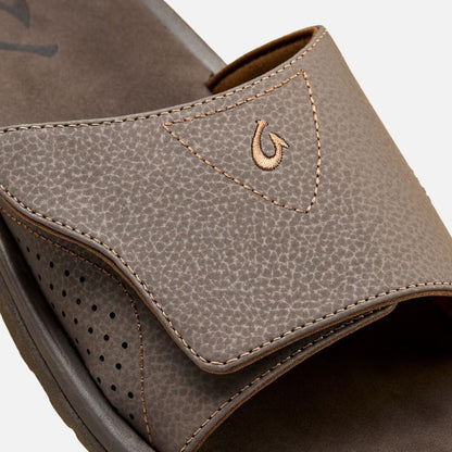 Dark Java leather slide with textured upper, contrasting stitching, and perforated vamp detail.