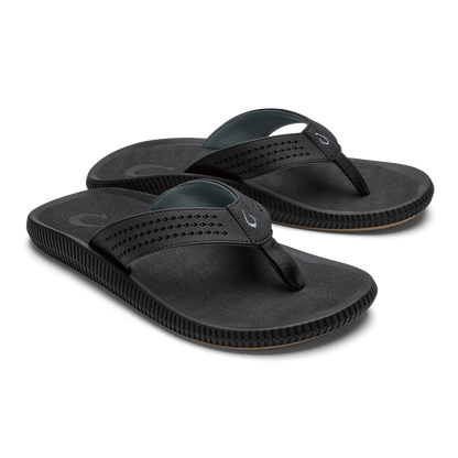 Pair of black thong flip-flops with textured straps and ridged soles.