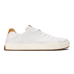 White leather low-top sneaker with cream sole and tan heel patch, laced closure.