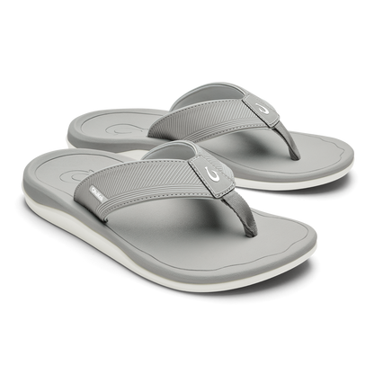 Pair of ash gray thong sandals with ribbed fabric straps and white sole.