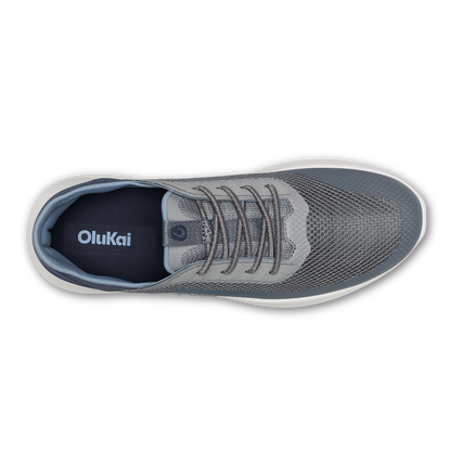 Charcoal mesh athletic shoe with gray laces, white sole, and navy blue interior lining, shown from above.