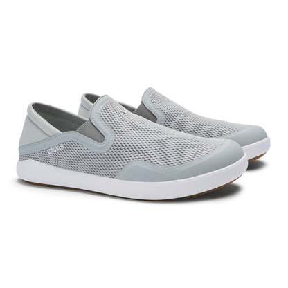 Pair of grey and white slip-on shoes with mesh upper and white sole, shown from a three-quarter view.