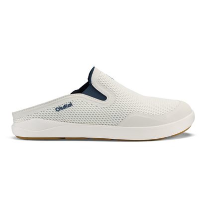 White and blue mesh slip-on mule shoe with cushioned sole and OluKai branding.