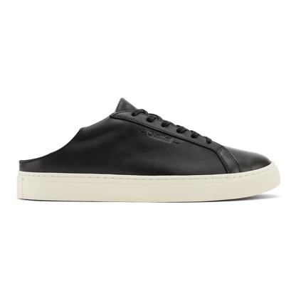 Black leather lace-up mule sneaker with cream-colored sole and open back heel.