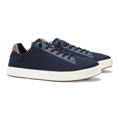 Navy textured lace-up sneakers with brown heel collar and cream rubber sole.
