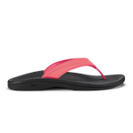 Hot pink and black thong sandal with curved black sole and padded pink strap.
