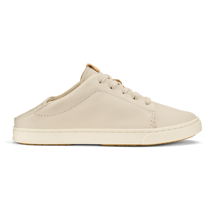 Cream leather slip-on mule with lace-up front, white sole, and tan heel trim.