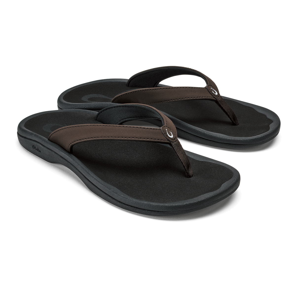 Pair of black flip-flops with dark brown straps and cushioned soles.